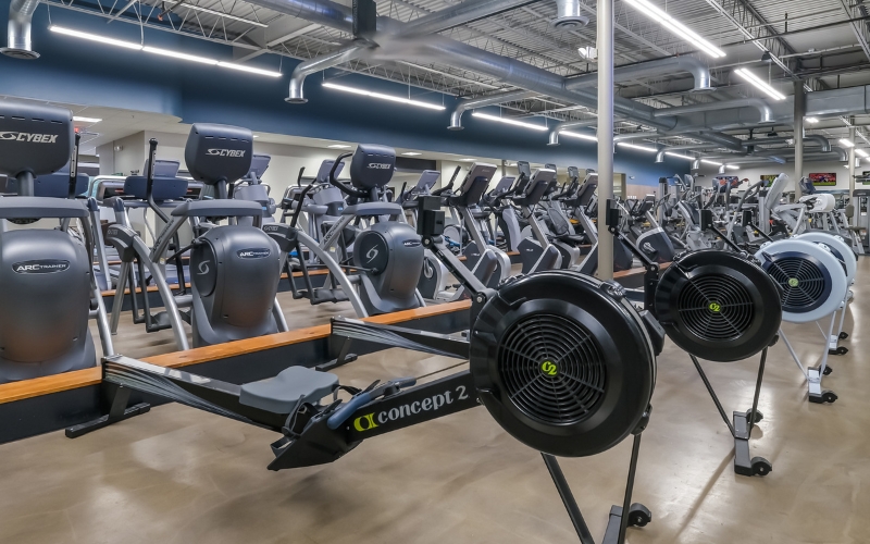 rowing machines lined up at cornerstone health and wellness center
