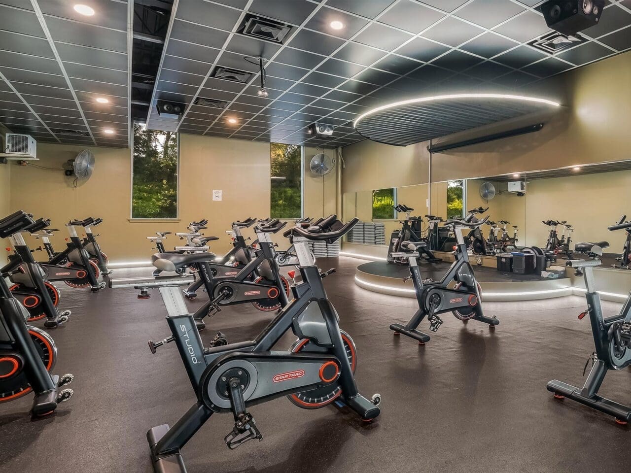 a spacious and private spinning studio for group fitness at a modern gym in pennsylvania