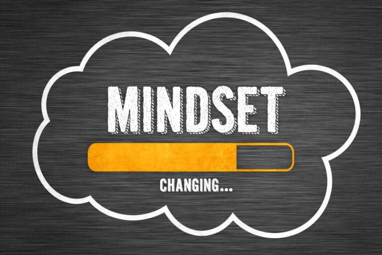 Illustration of a cloud that includes the words mindset and change.