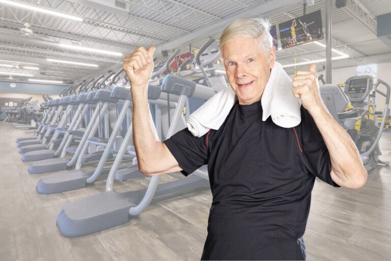 Healthy senior man standing in the gym.