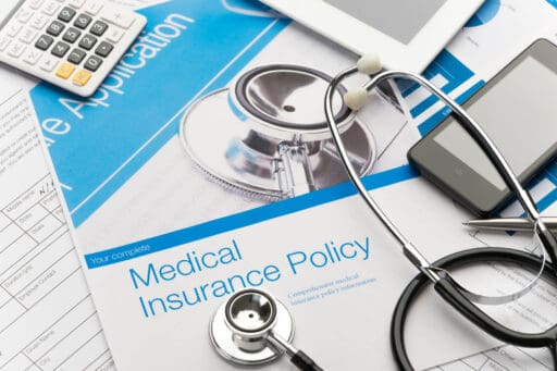 Health insurance policy paperwork